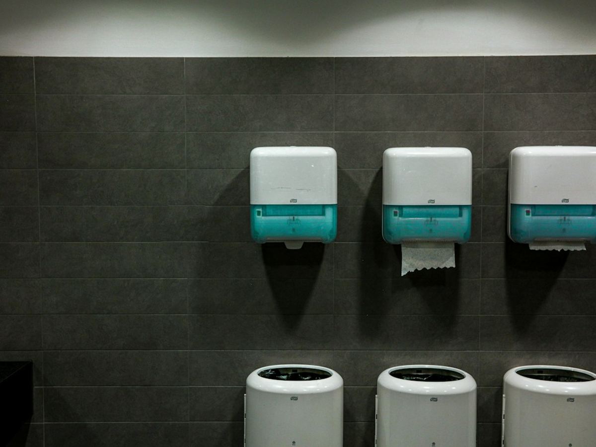 Hand towel dispensers in a commercial washroom