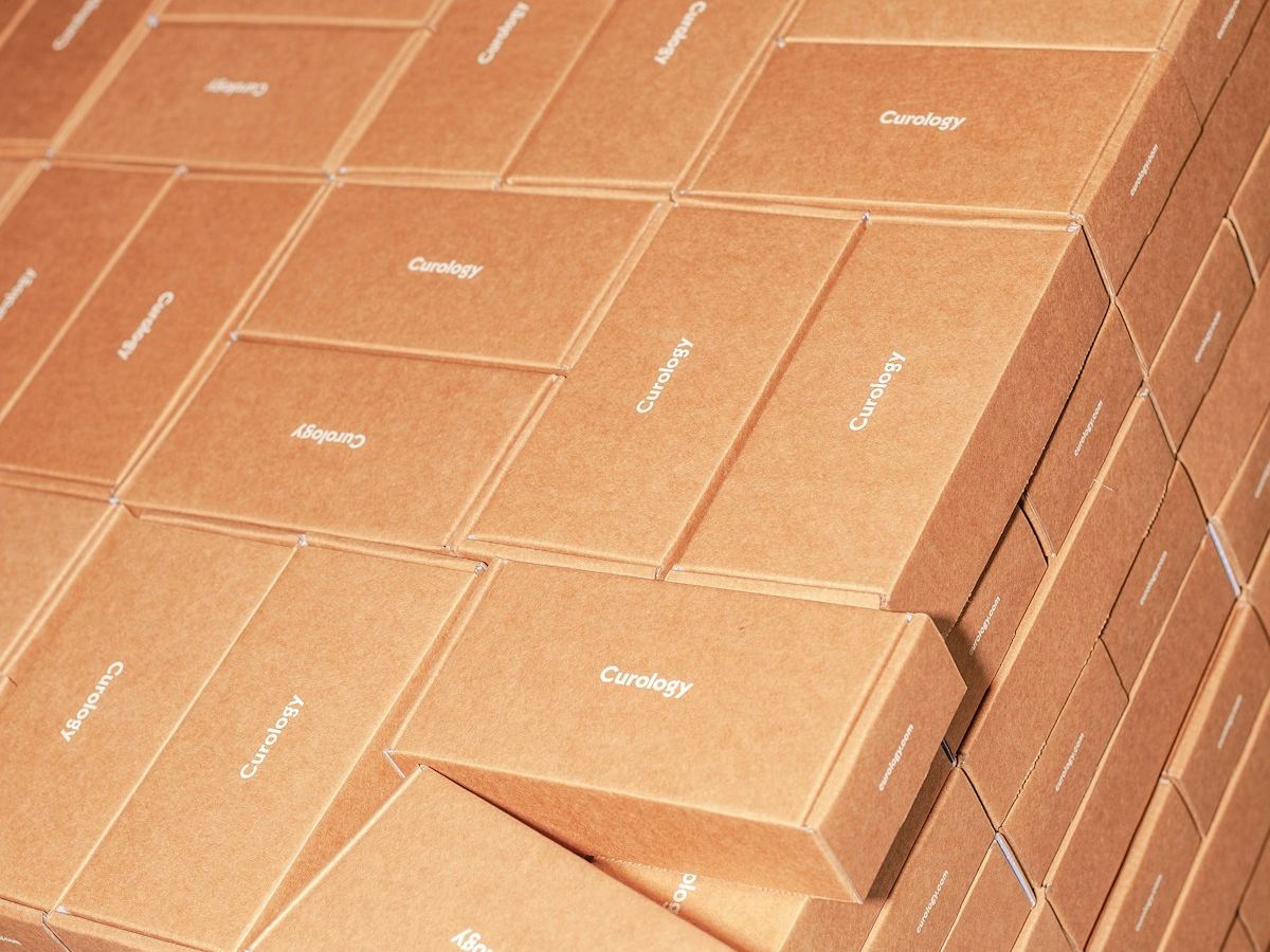Stacked custom-printed kraft cartons